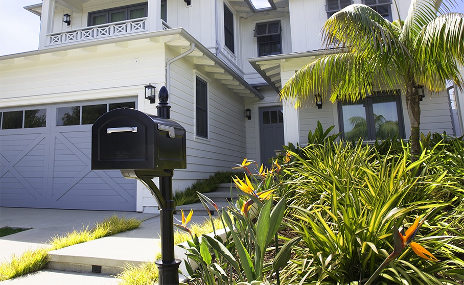 Black Mailbox in Front of a House