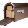 Open brown mailbox with packages and mail inside