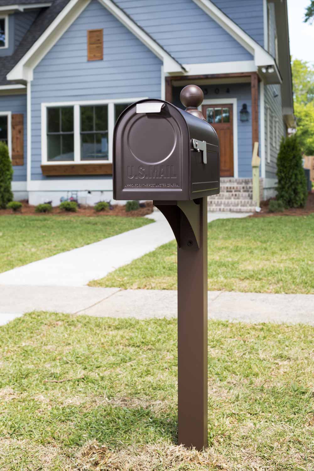 Decorative Background of Bronze Post Mount Mailbox