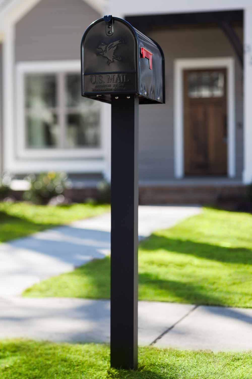 Black mailbox on decorative background