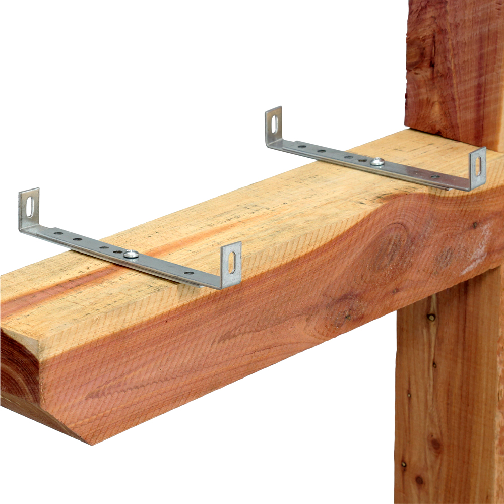 Two metal L-brackets with holes mounted on a wooden beam to provide structural support.