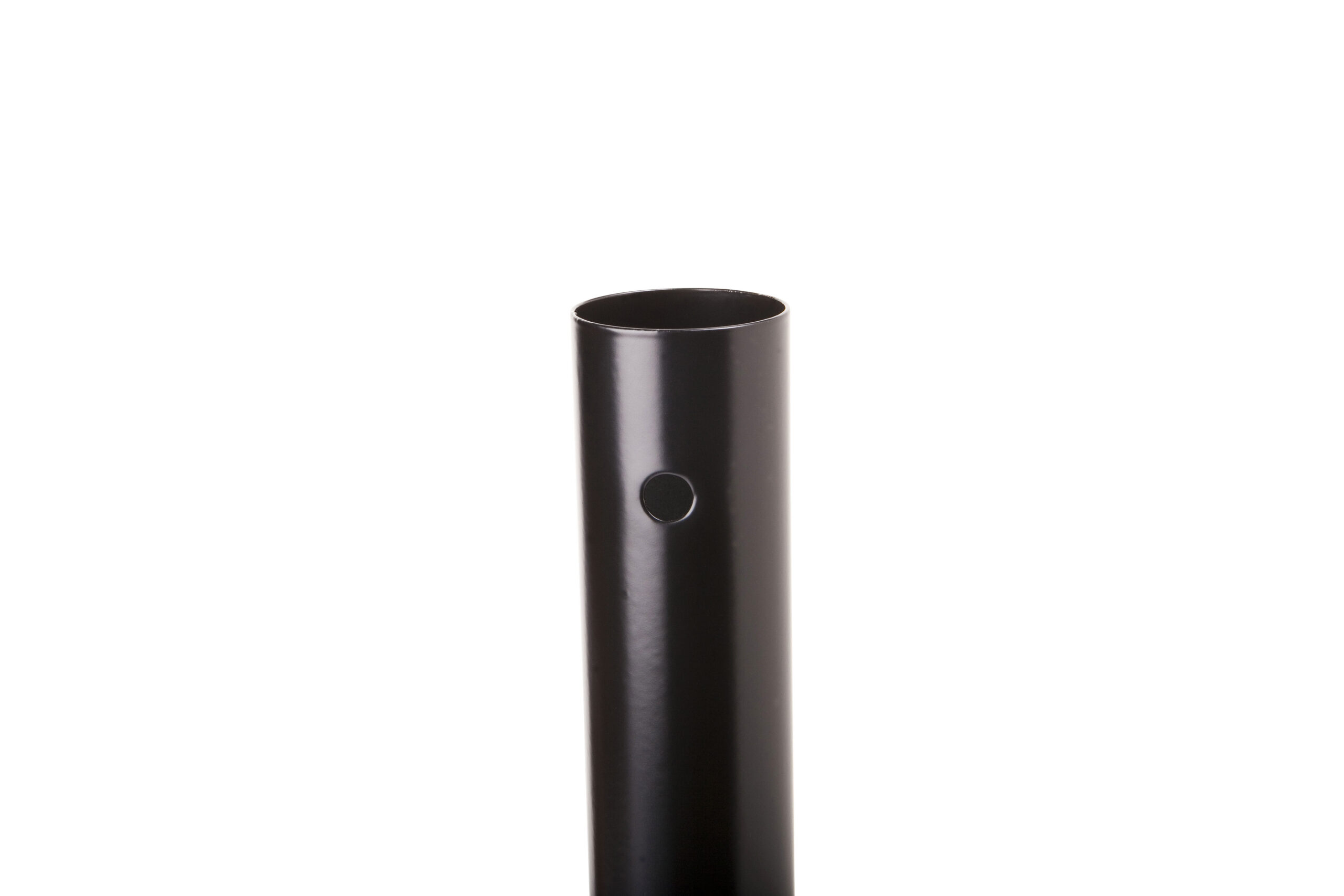 Black cylindrical metal tube standing upright with a small central hole, set against a white background.
