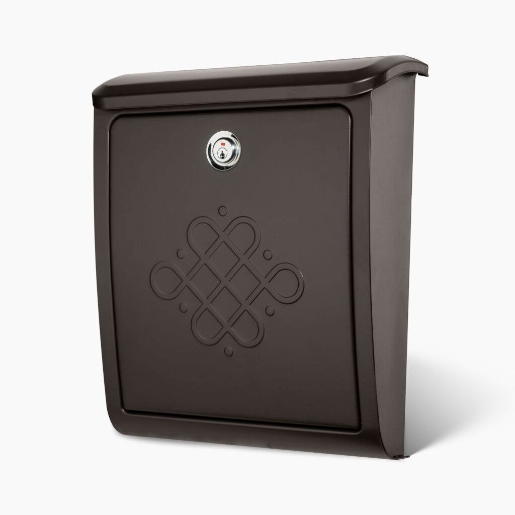 Brown metal wall-mounted mailbox with a round key lock and a decorative embossed geometric pattern on the door