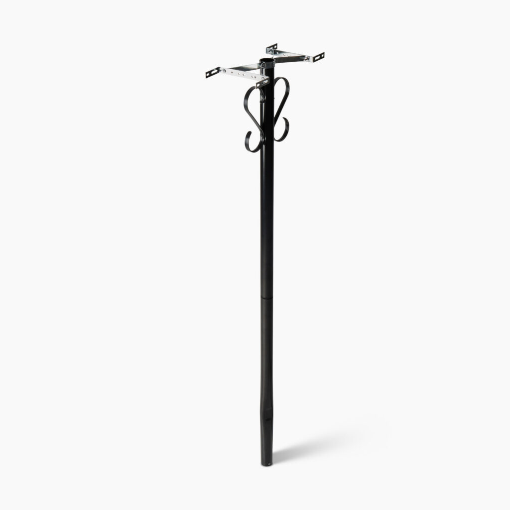 Tall black freestanding coat rack with four curled metal hooks at the top, standing on a simple base.