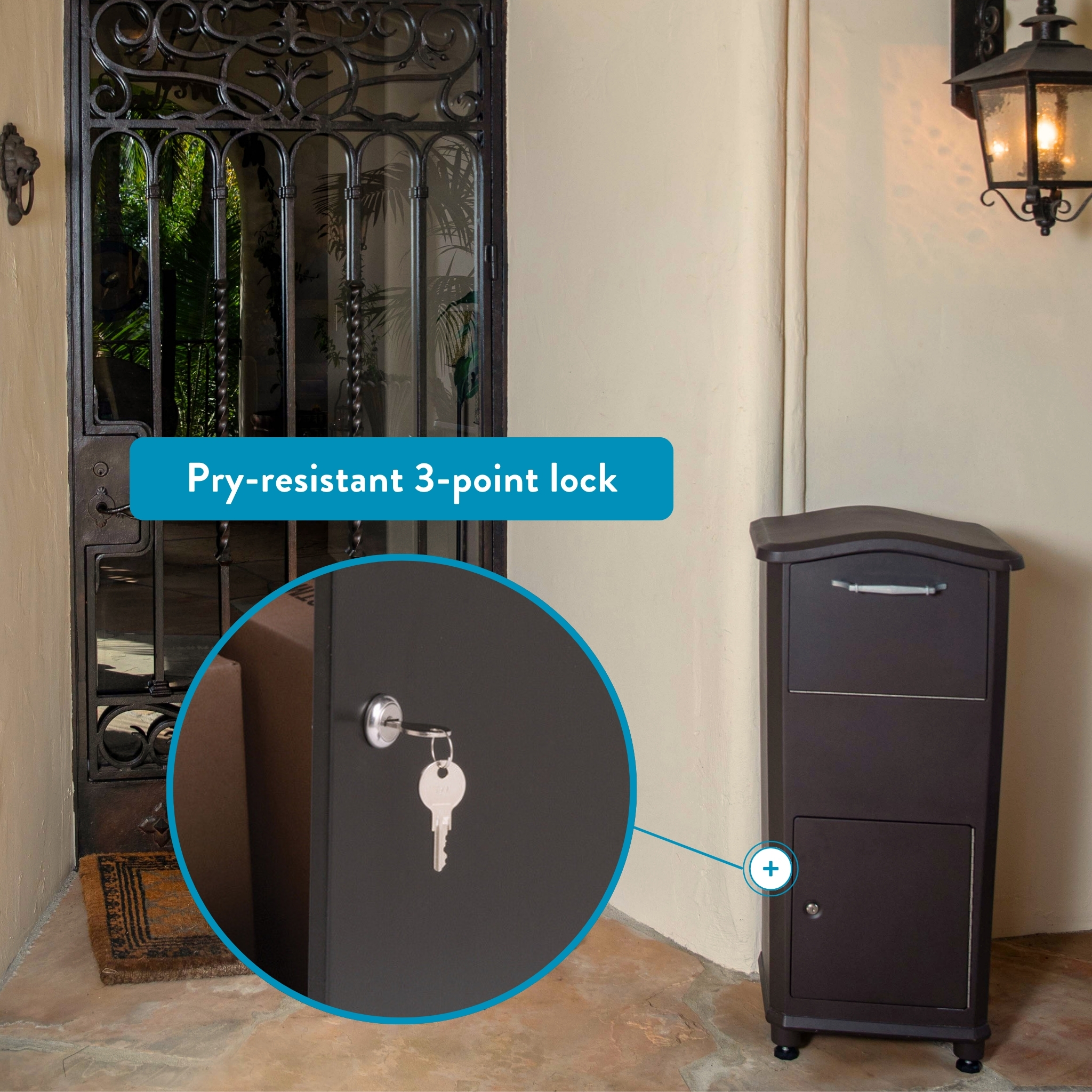 Door with pry-resistant 3-point lock; key hanging in lock, inset magnified view indicating security feature