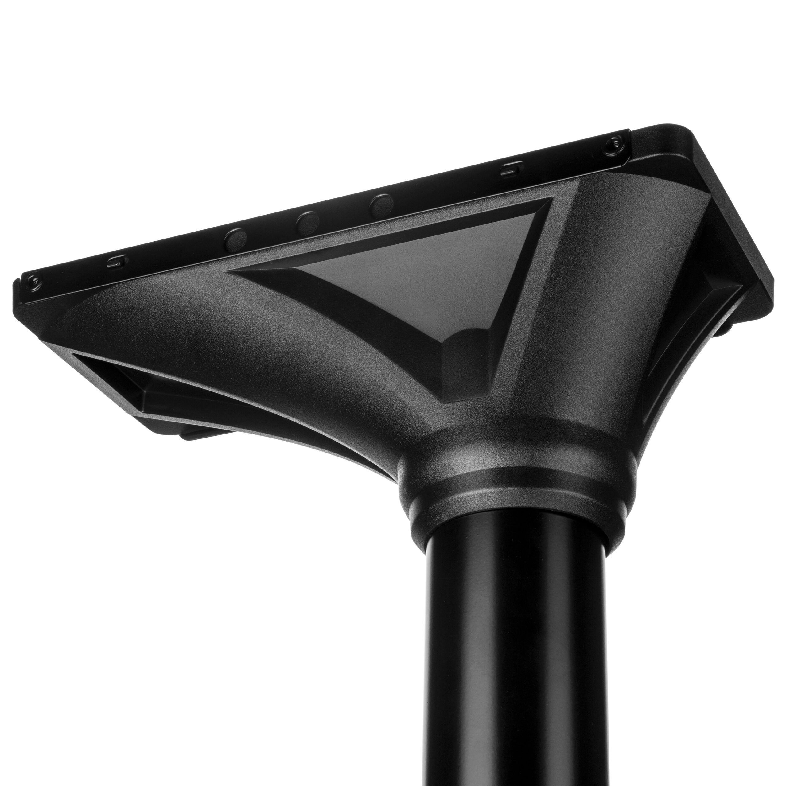 Close-up of a black outdoor floodlight head mounted on a pole with a sleek angular design.