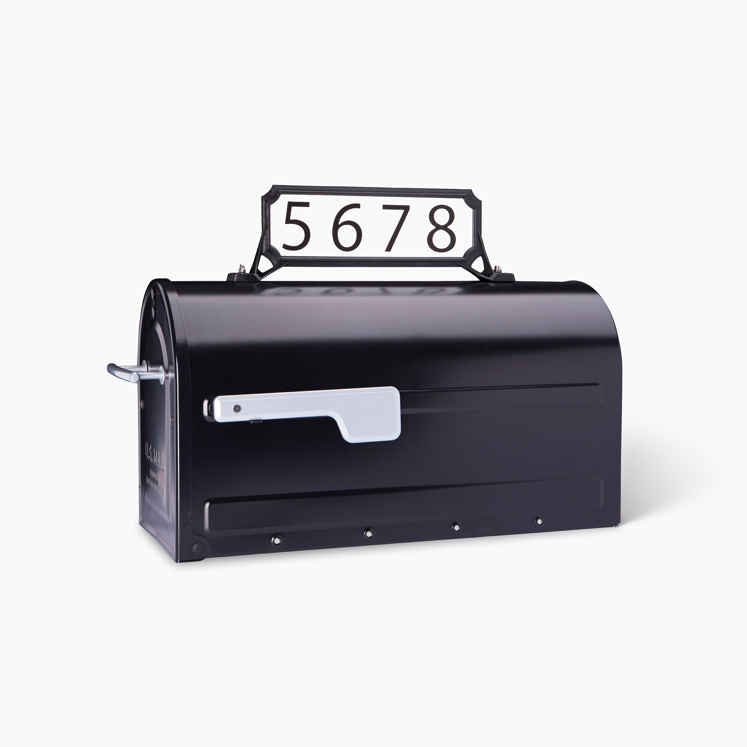 Black metal curbside mailbox with a white address plaque reading 5678 on top and a silver lever on the side.