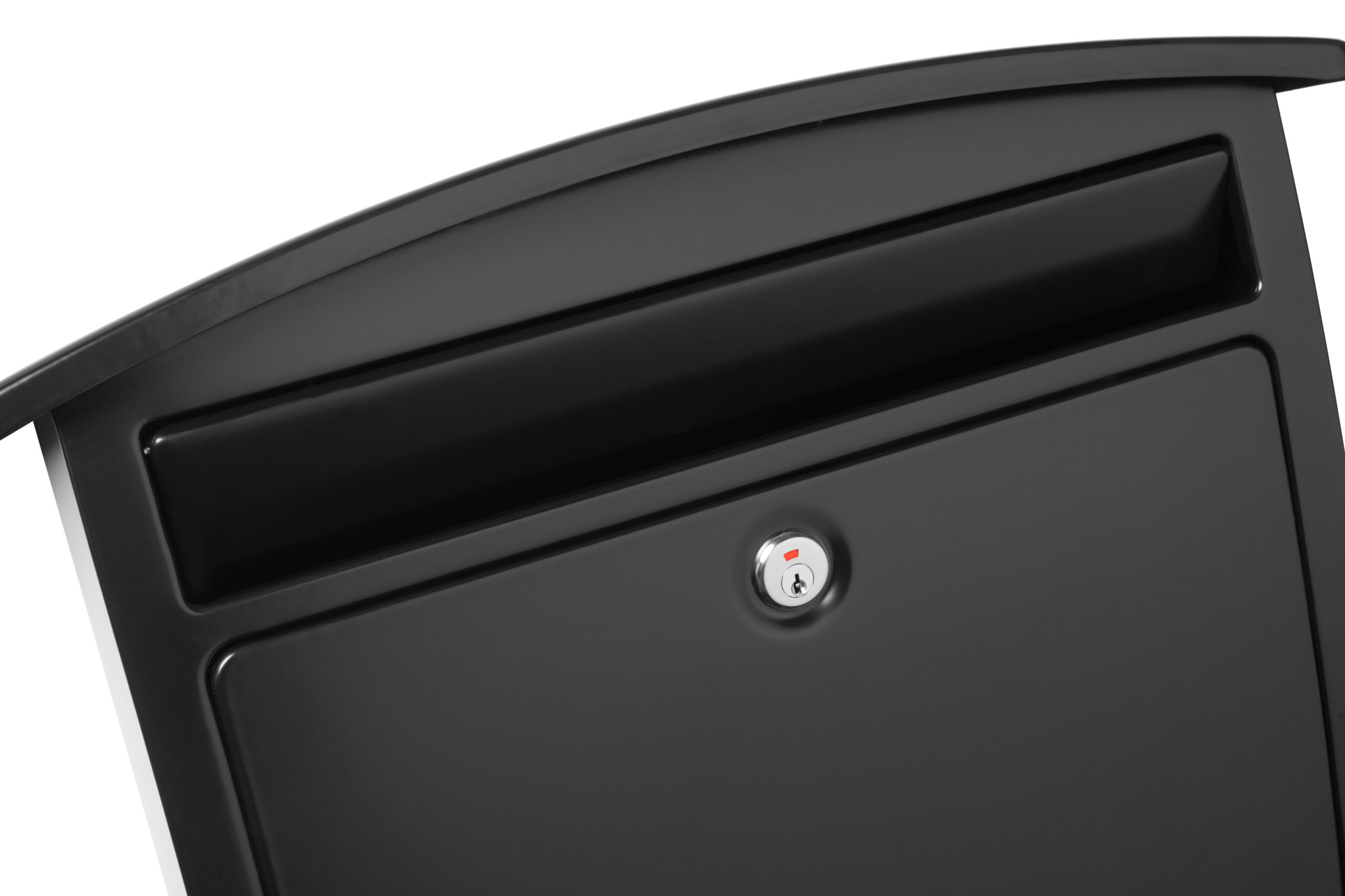 Close-up of a black metal mailbox with a curved top and a small front lock area.