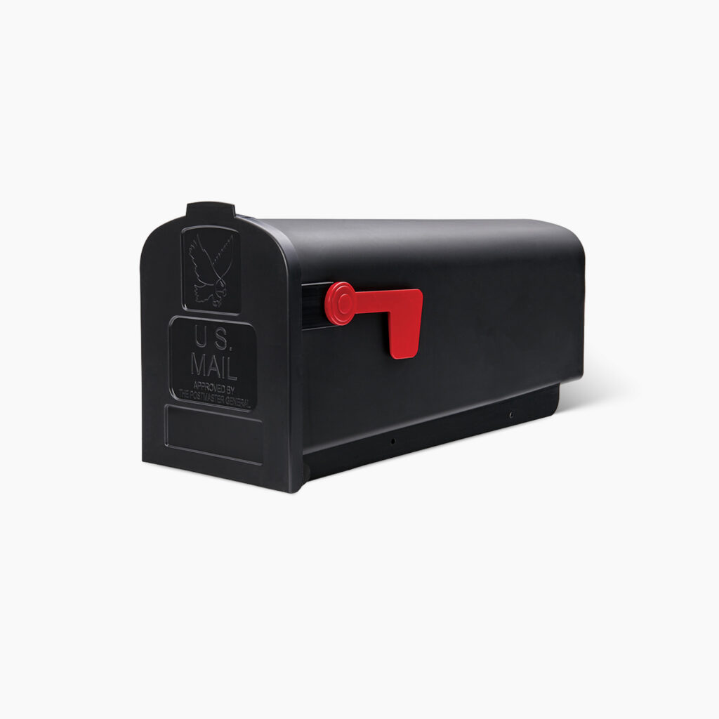 Black curbside US Mail mailbox with a red raised flag.