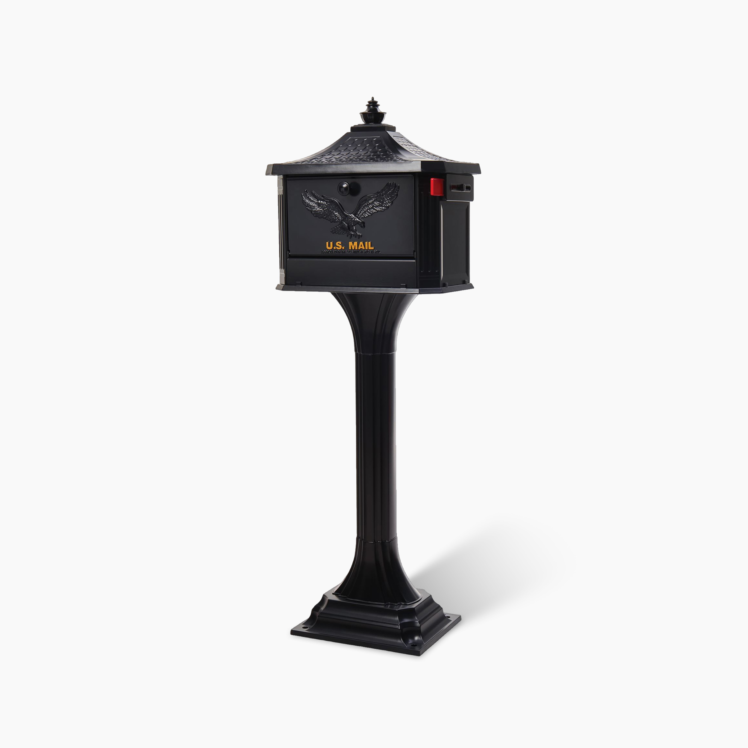 Black U.S. Mail mailbox mounted on a tall pedestal stand with an eagle emblem on the front panel.